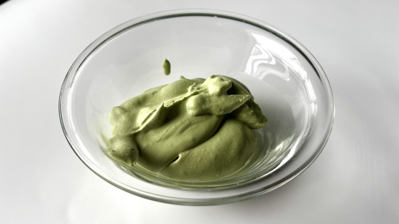 green whipped cream in bowl