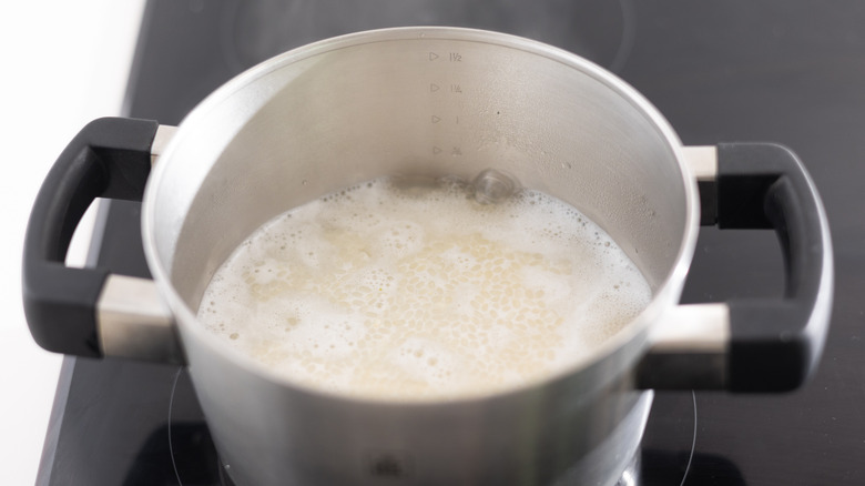 rice cooking in pot 