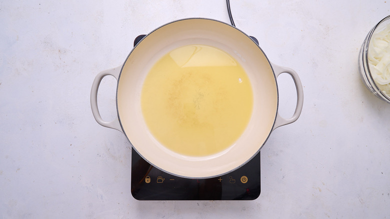 heating oil in a skillet