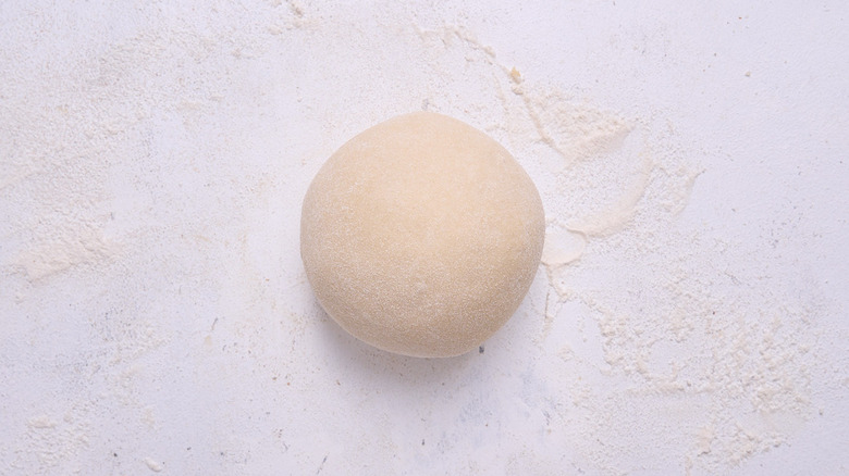 smooth ball of dough on table