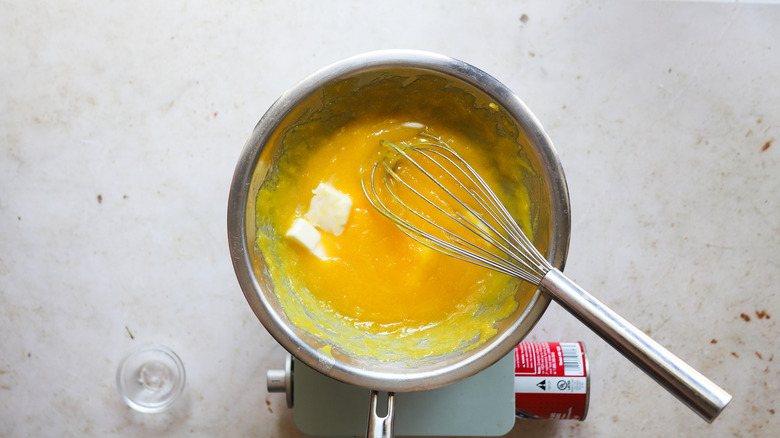 Bowl with lemon curd and butter