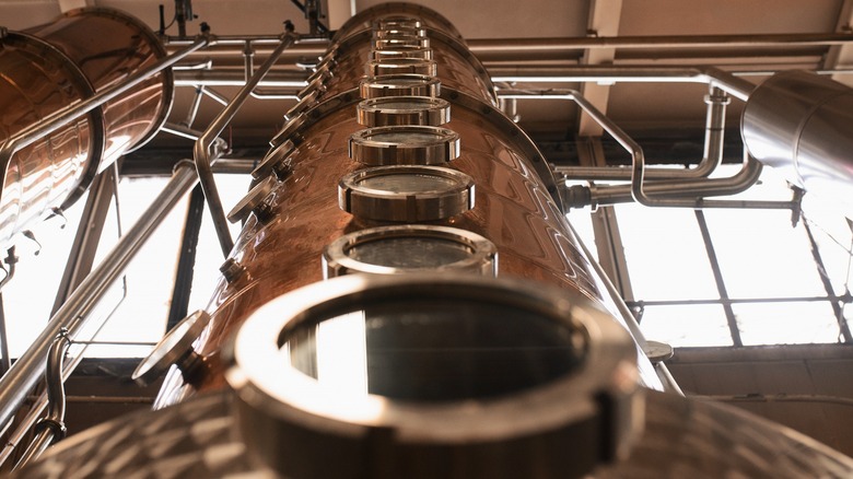 Looking up a tall copper column still