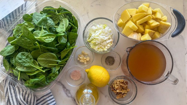 Triple spinach soup ingredients on countertop