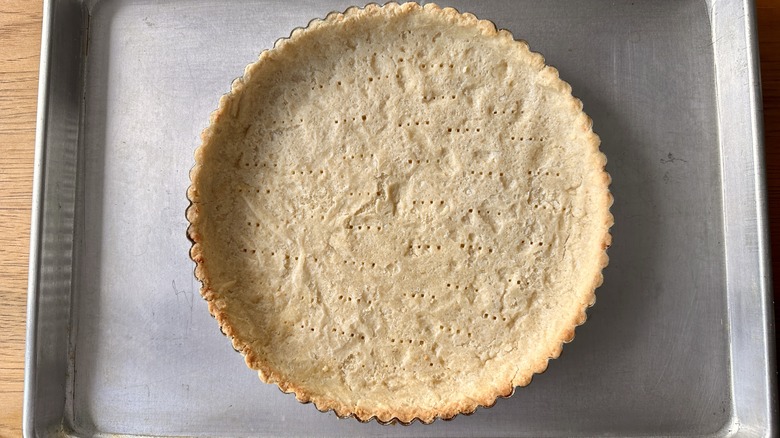 Baked tart shell in pan