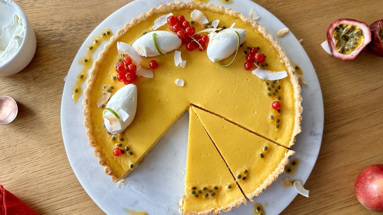 Passion fruit tart with whipped cream