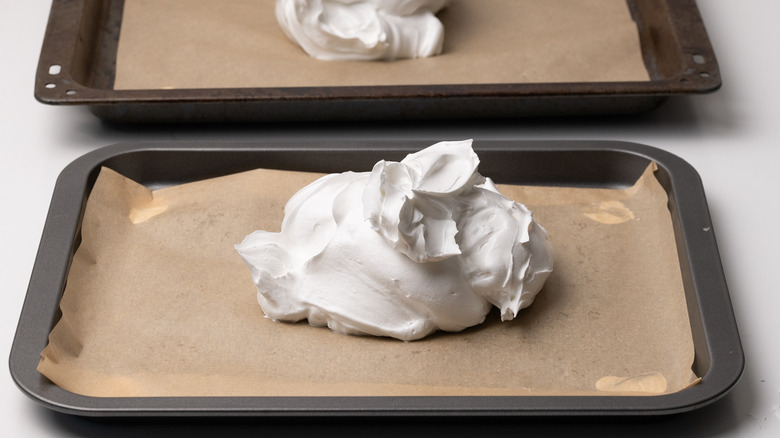 meringue heaped on baking sheet