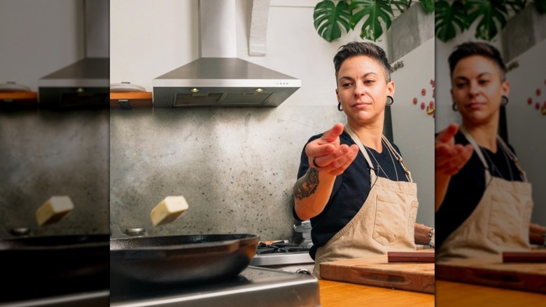 Chef Tucker throwing butter pan