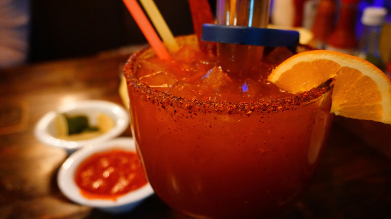 Mango Michelada with an orange slice