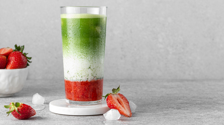 strawberry matcha drink in glass