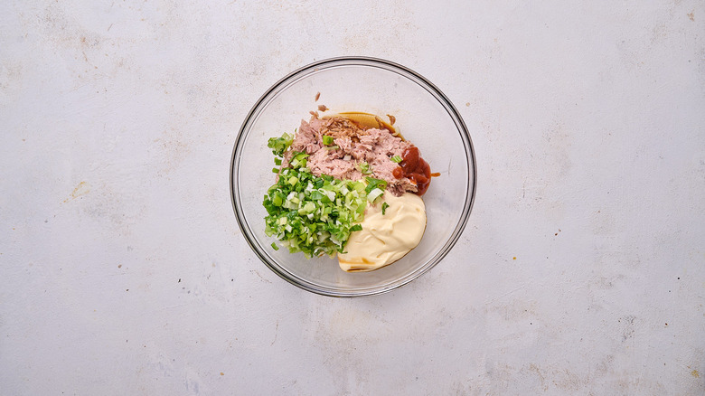 tuna salad ingredients in bowl