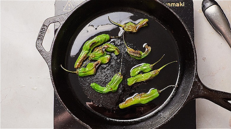 shishito peppers in pan