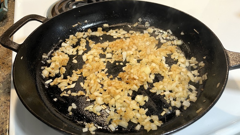 onions cooking in skillet