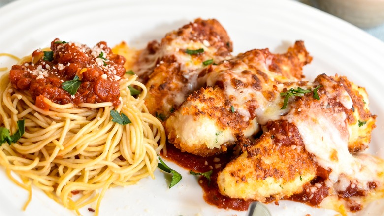 Chicken parmesan tenders with spaghetti