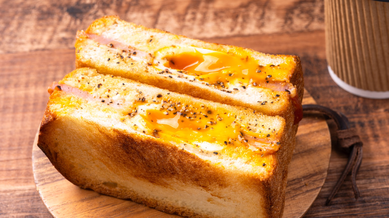 grilled cheese with egg and ham in the middle, cut open