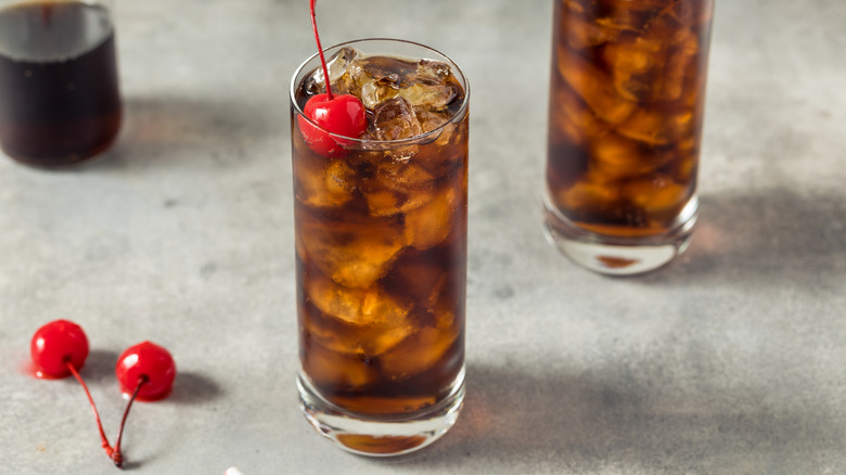 rum and coke with cherry