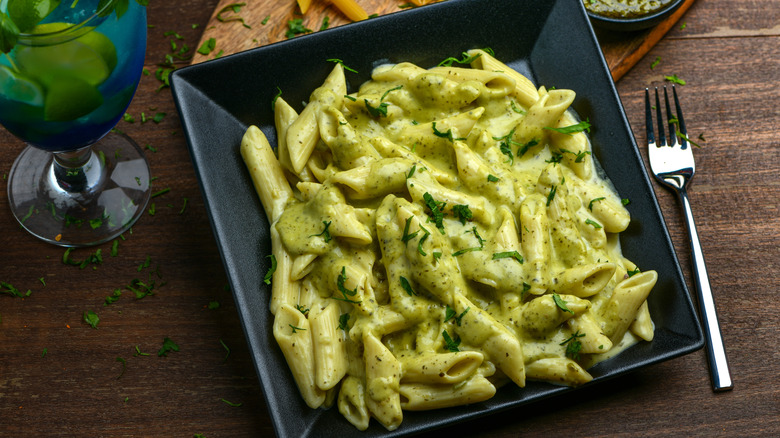 Creamy pesto pasta with herbs