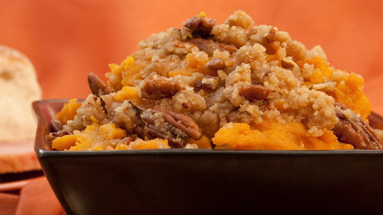 sweet potato souffle in a black bowl