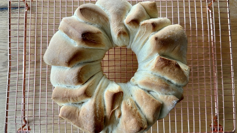 Baked bread on cooling rack