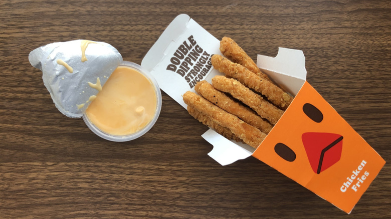 Burger King Nacho Chicken Fries and cheese sauce.