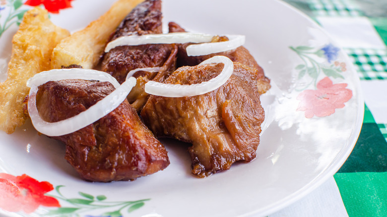 Cuban fried pork chunks dish