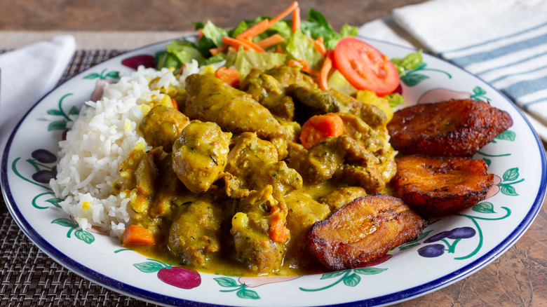 Plate of Jamaican food on table