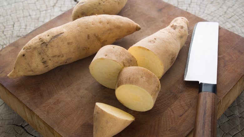 Hannah sweet potatoes with knife