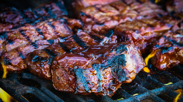 Boneless beef short ribs on the grill