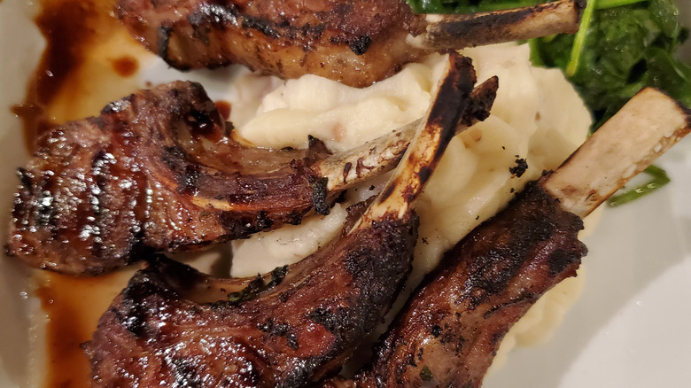 Lamb riblets with mashed potatoes and spinach