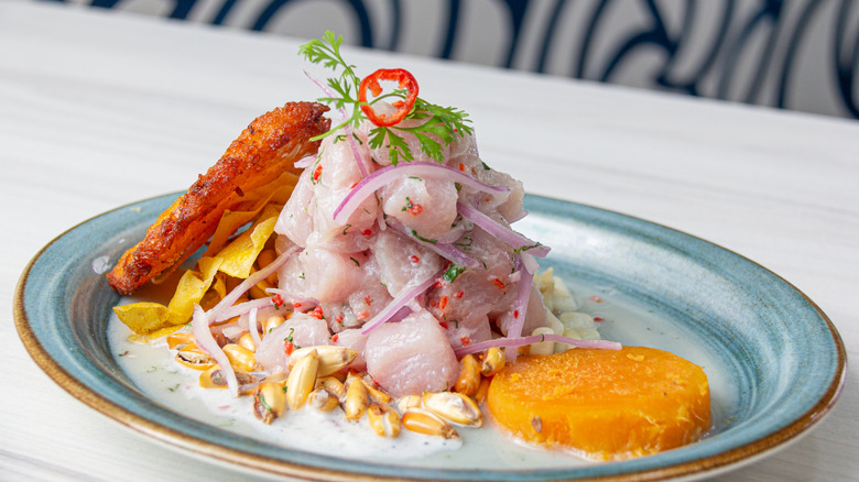 Ceviche and corn cakes