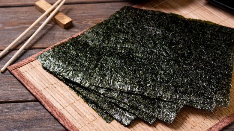 sheets of dried nori on mat