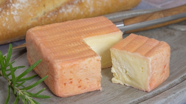 Maroilles cheese with piece cut