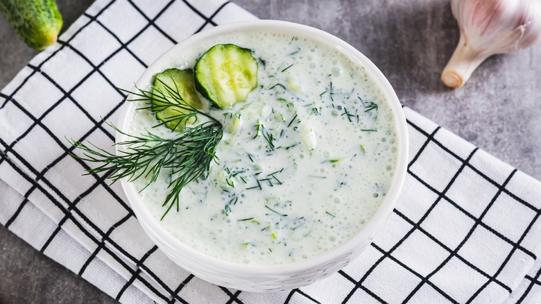 Bowl of tzatziki on tea towel