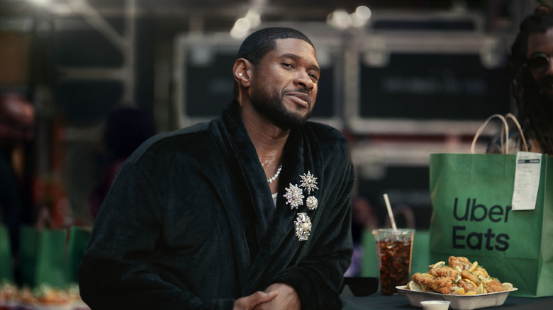 Usher with Uber Eats bag