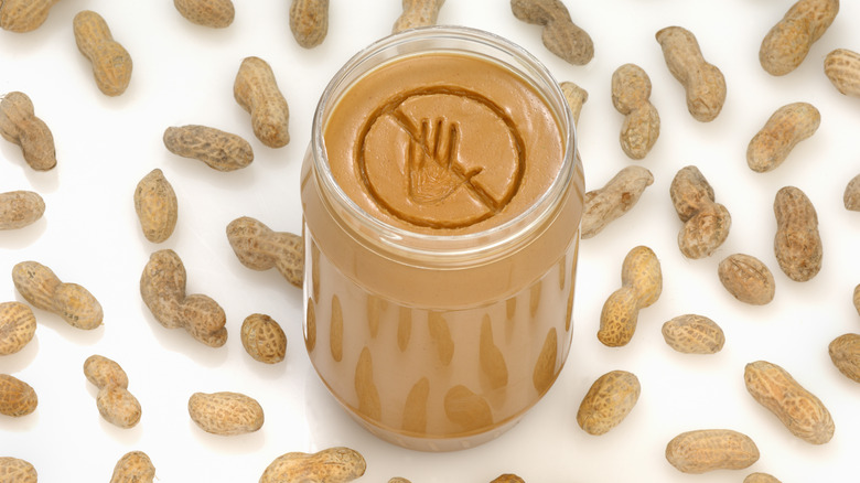 Peanut butter with a no eat symbol