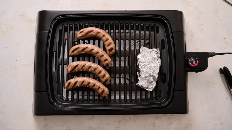 grilled sausages on grill