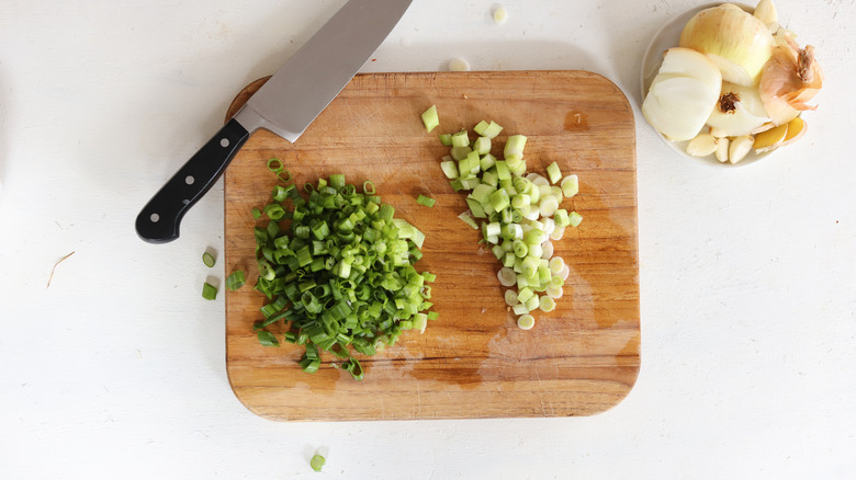 chopped green onions on cutting board