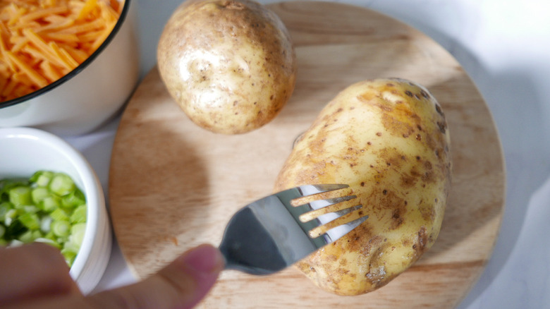 potatoes on a cutting board 