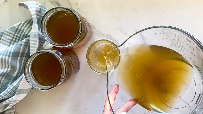 jars with broth and lids