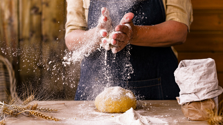 Person preparing pasta dough