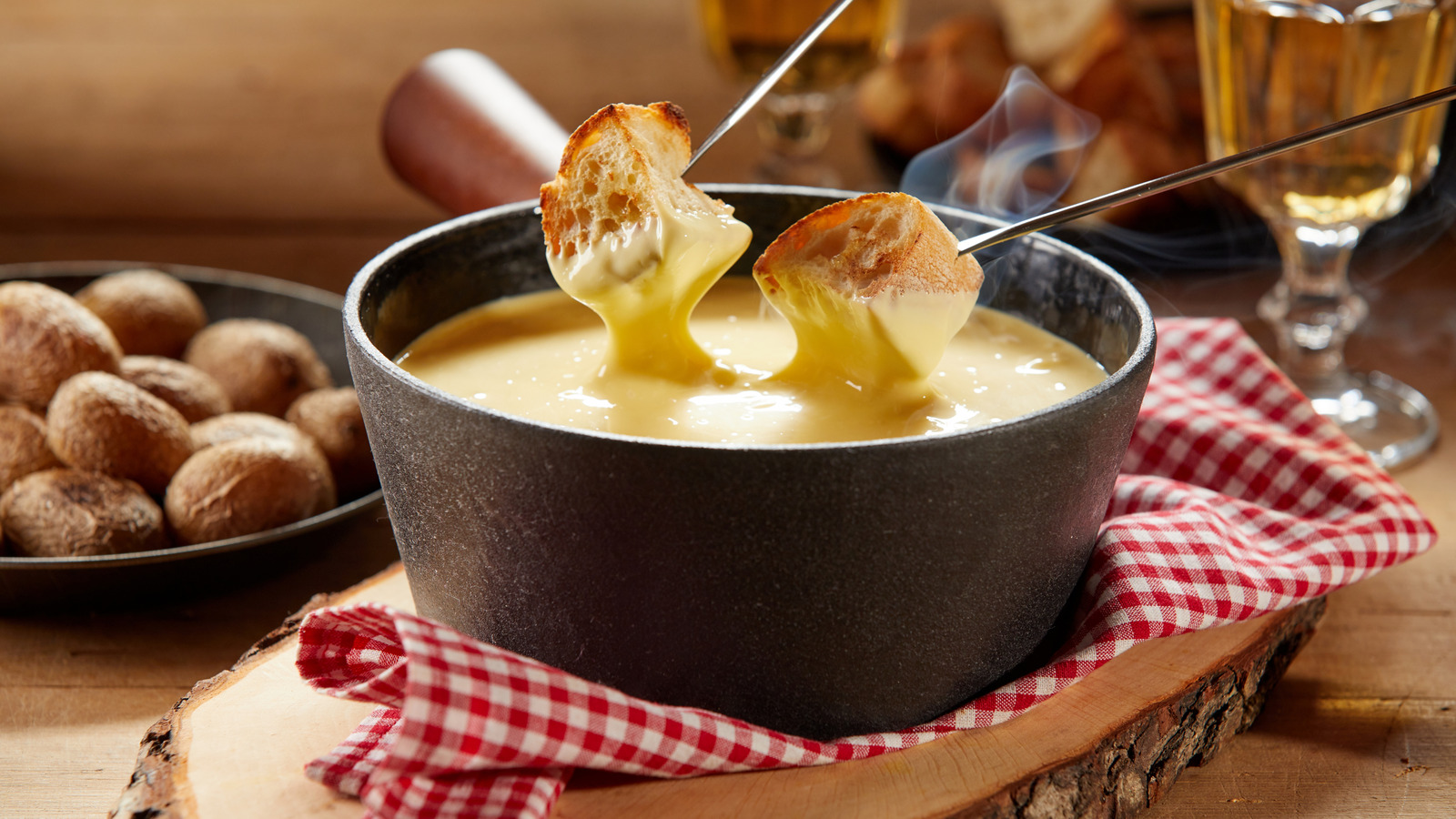 Upgrade Fondue With A Splash Of Brandy To Temper The Richness - Tasting Table