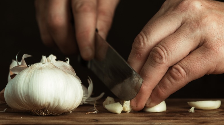 cutting garlic cloves