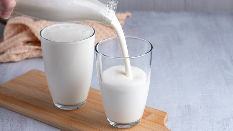 pouring buttermilk into glasses