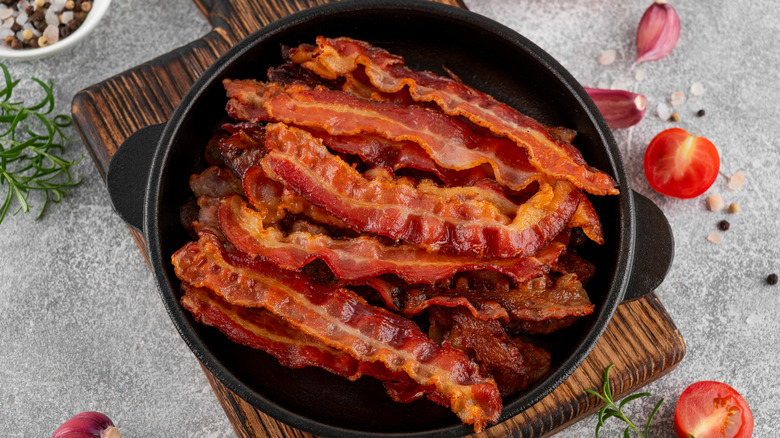 Fried bacon slices in a pan