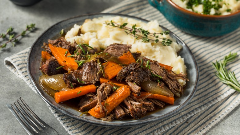 Pot roast with carrots and mashed potatoes