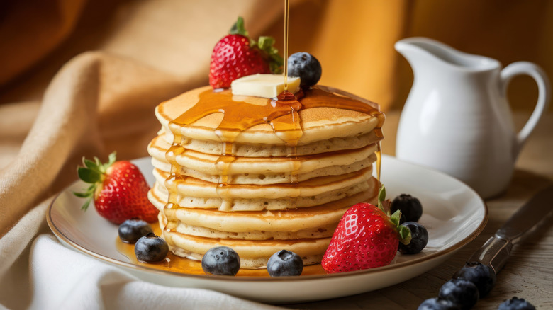 Pancakes with syrup and berries