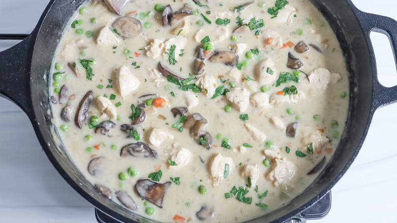 creamy chicken dish in skillet