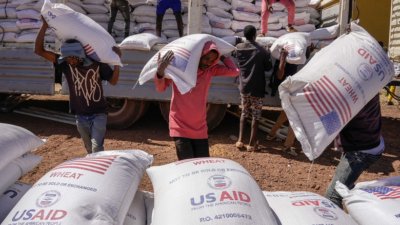 unloading truck of USAID wheat