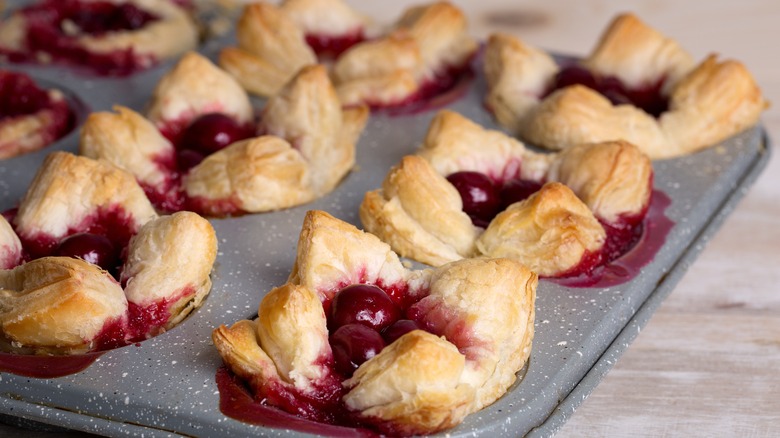 Cherry pies in muffin tin