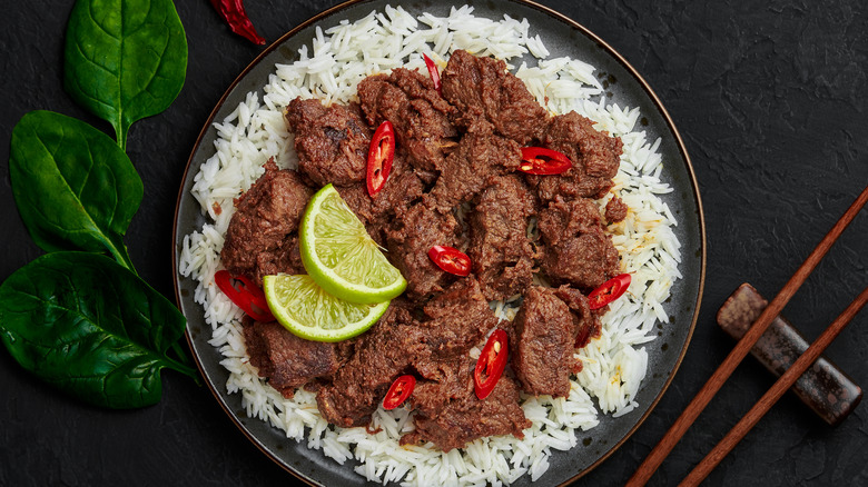 plate of beef rendang with rice