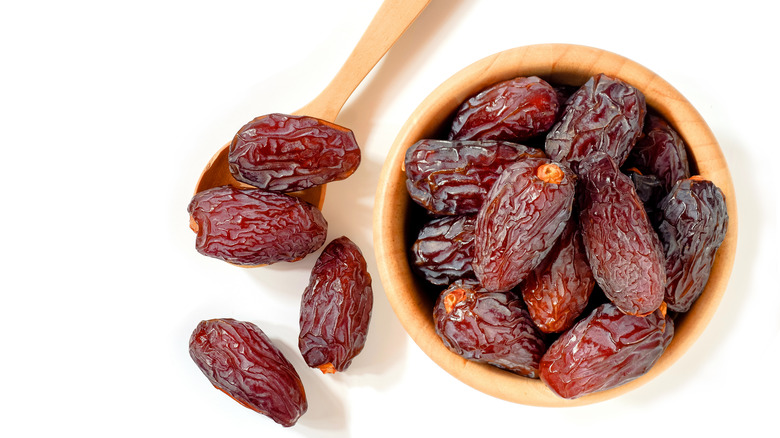 a bowl filled with medjool dates